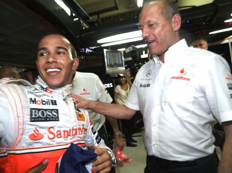 Lewis Hamilton and Ron Dennis in 2008 after Brazilian GP