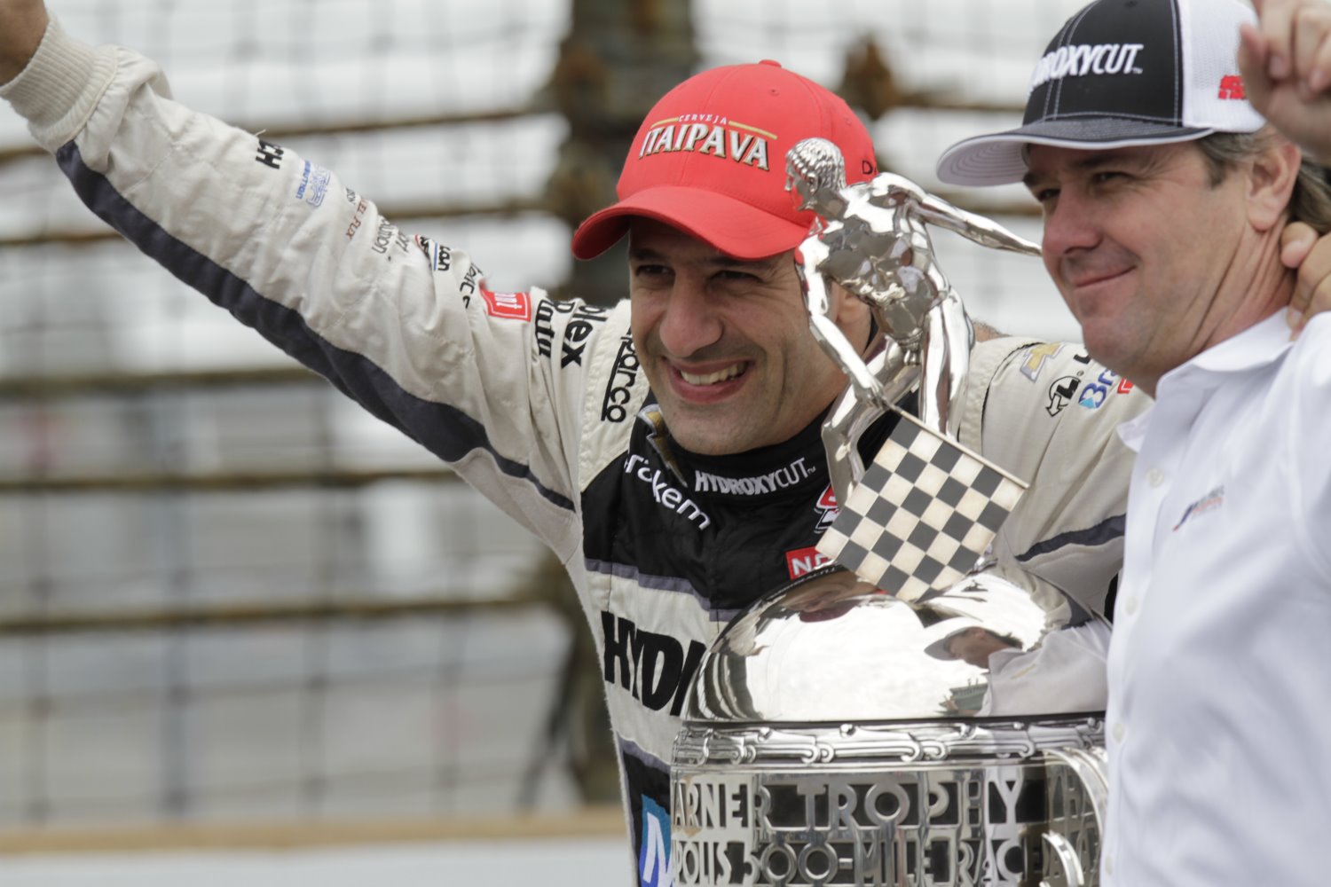 Tony Kanaan and Jimmy Vasser after winning the 2013 Indy 500. Now the team is gone.
