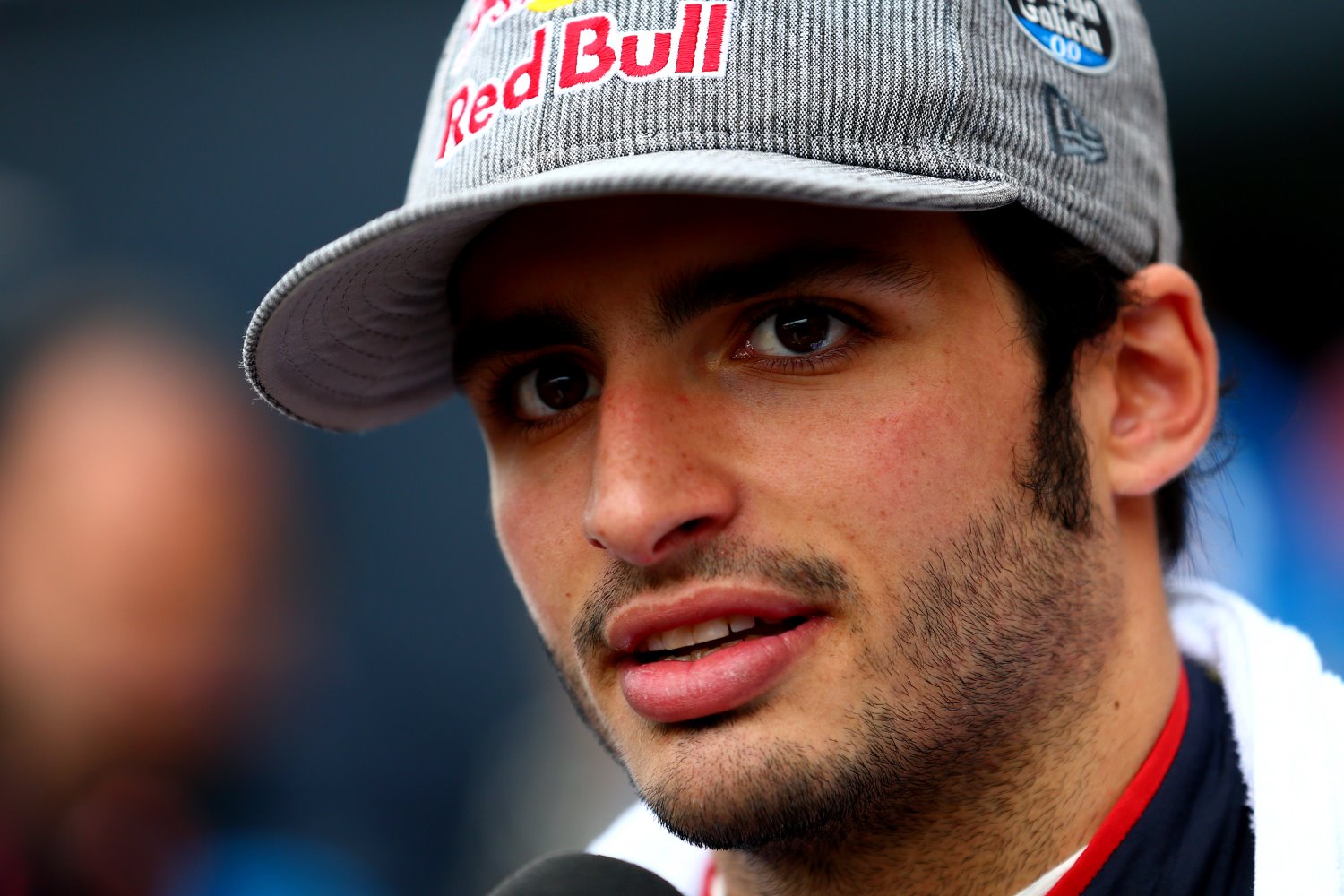 2015 - Carlos Sainz of Spain and Scuderia Toro Rosso speaks with members of the media in the paddock after qualifying for the Monaco Formula One Grand Prix at Circuit de Monaco on May 23, 2015 in Monte-Carlo, Monaco. (Photo by Dan Istitene/Getty Images for Red Bull)