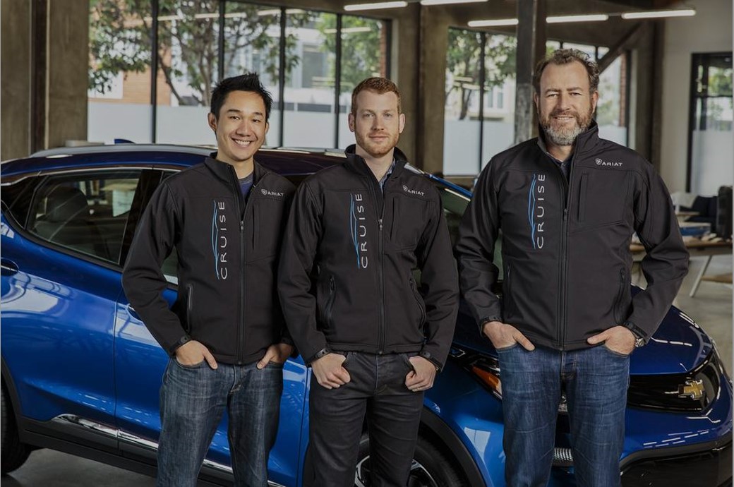 General Motors Co. President Dan Ammann, right, with the co-founders of Cruise Automation Inc., Kyle Vogt, center, and Daniel Kan. Autonomous-vehicle startup Cruise is being acquired by GM