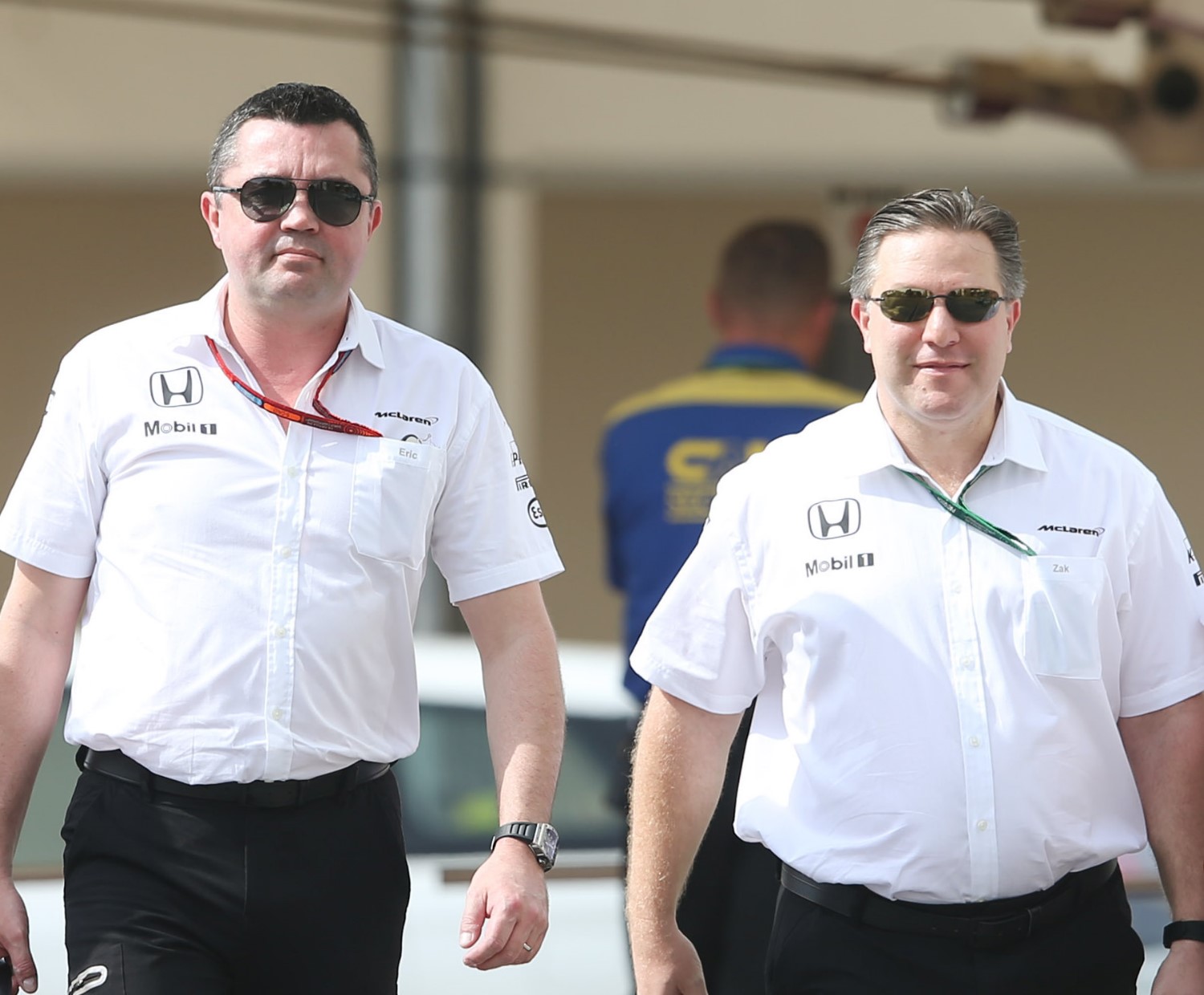 Boullier and Brown arrive at the Abu Dhabi circuit