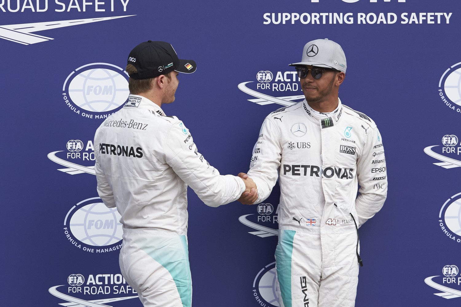 Rosberg greets an unhappy Hamilton