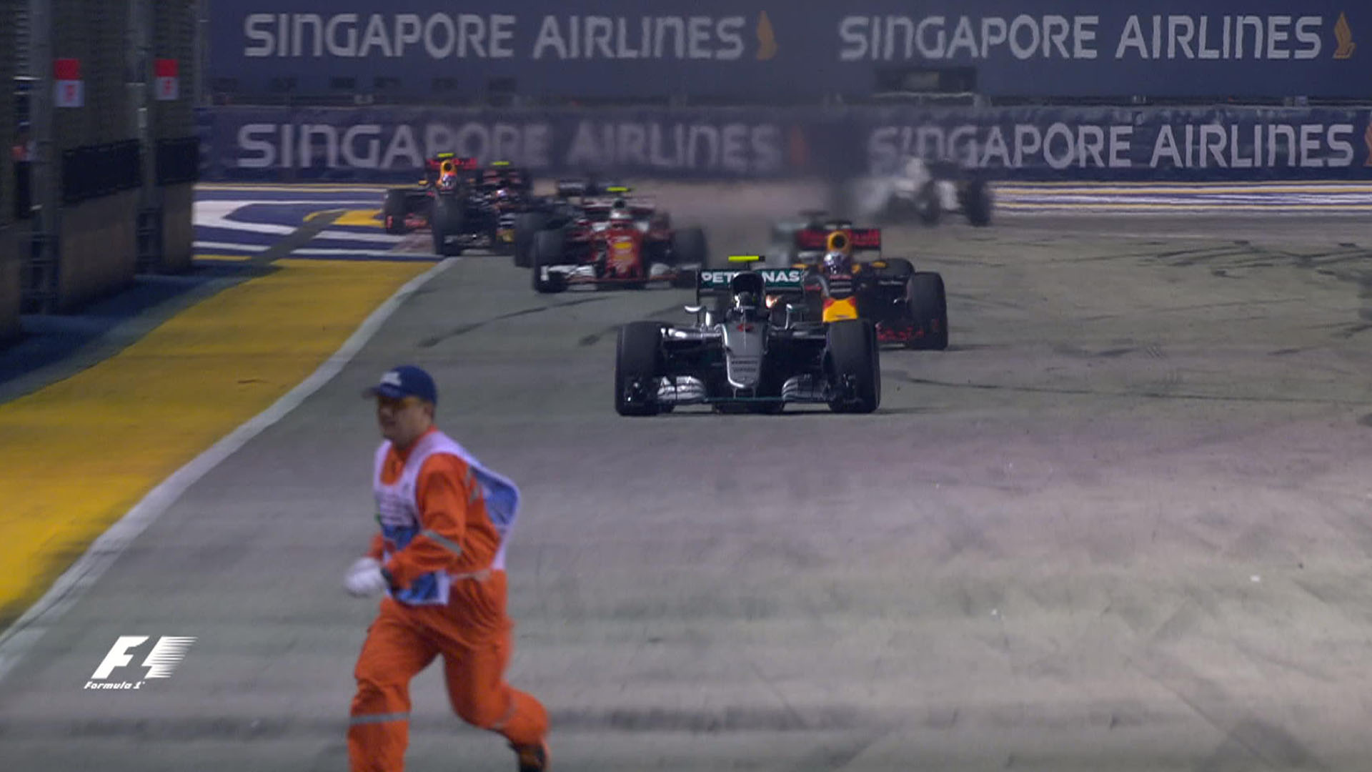 Nico Rosberg almost takes out a safety Marshal in Singapore