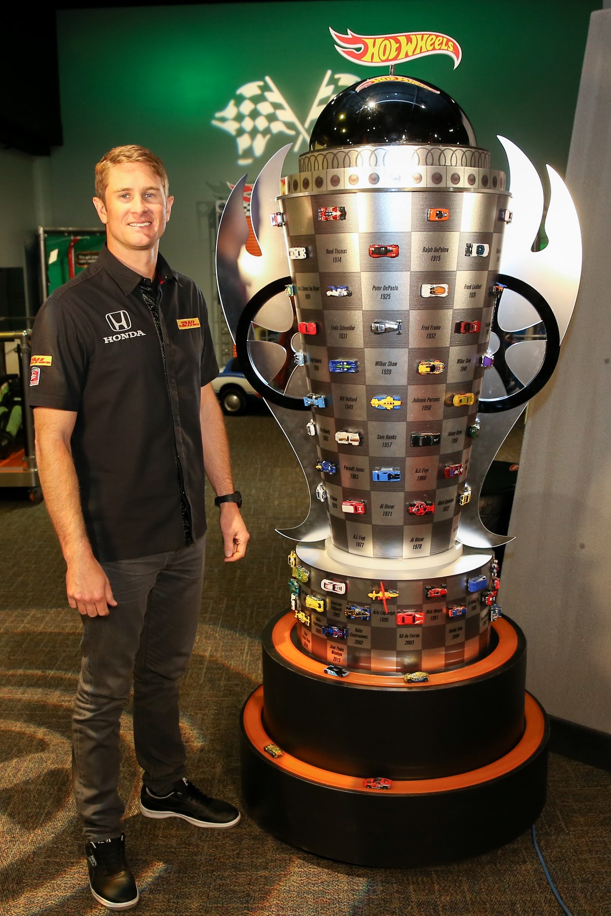 Ryan Hunter-Reay with the Hot Wheels replica of the Borg-Warner trophy