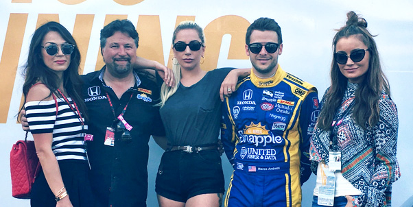 Lady Gaga (C) with Michael and Marco Andretti