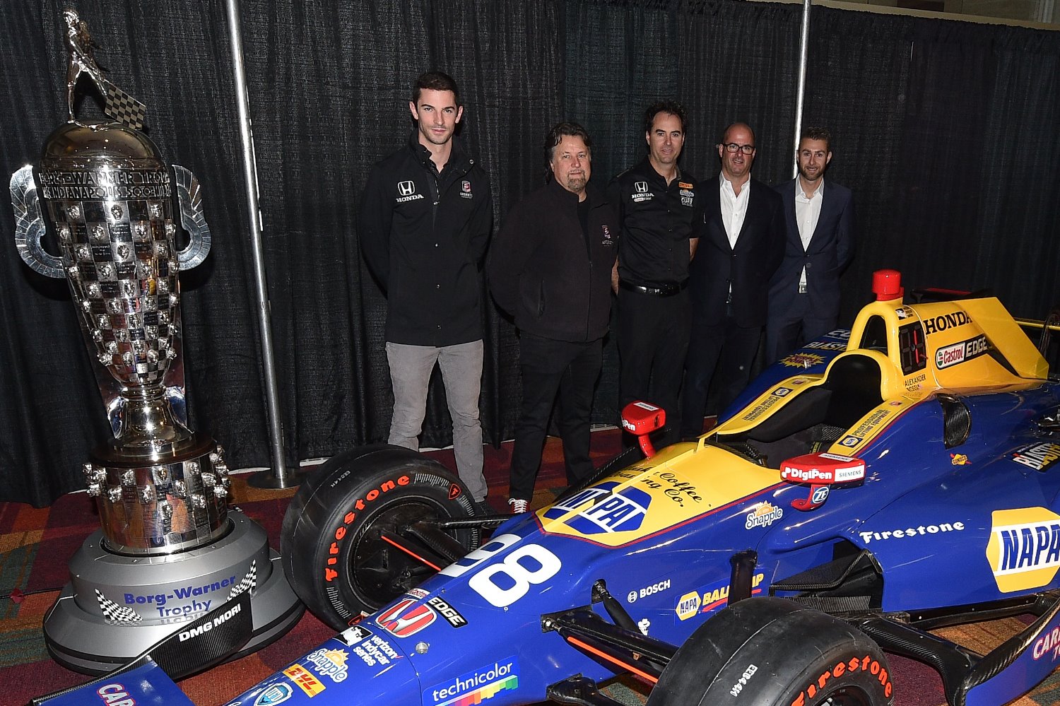 Alexander Rossi, Michael Andretti, Bryan Herta, and David Bowen donate the winning car of the 100th Indianapolis 500 to the Indianapolis Motor Speedway Museum