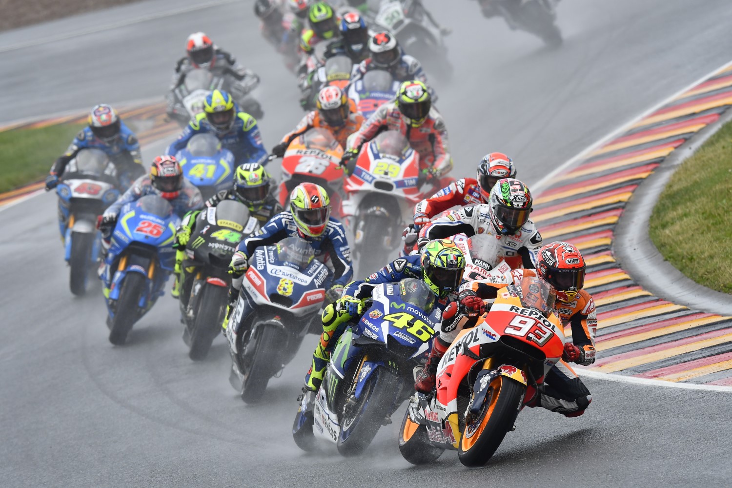 Marquez leads at wet start