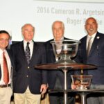 From the left are Duke and J.C. Argetsinger, sons of Cameron Argetsinger, Penske and Bobby Rahal, Indianapolis 500 champion and chairman of the IMRRC Governing Council