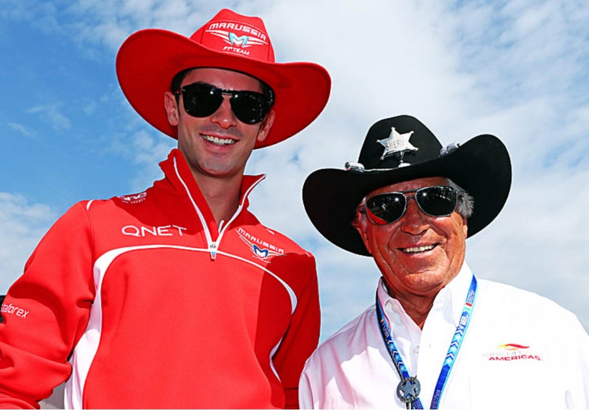Rossi (L) was on the path to F1 will now drive for Mario Andretti's son Michael