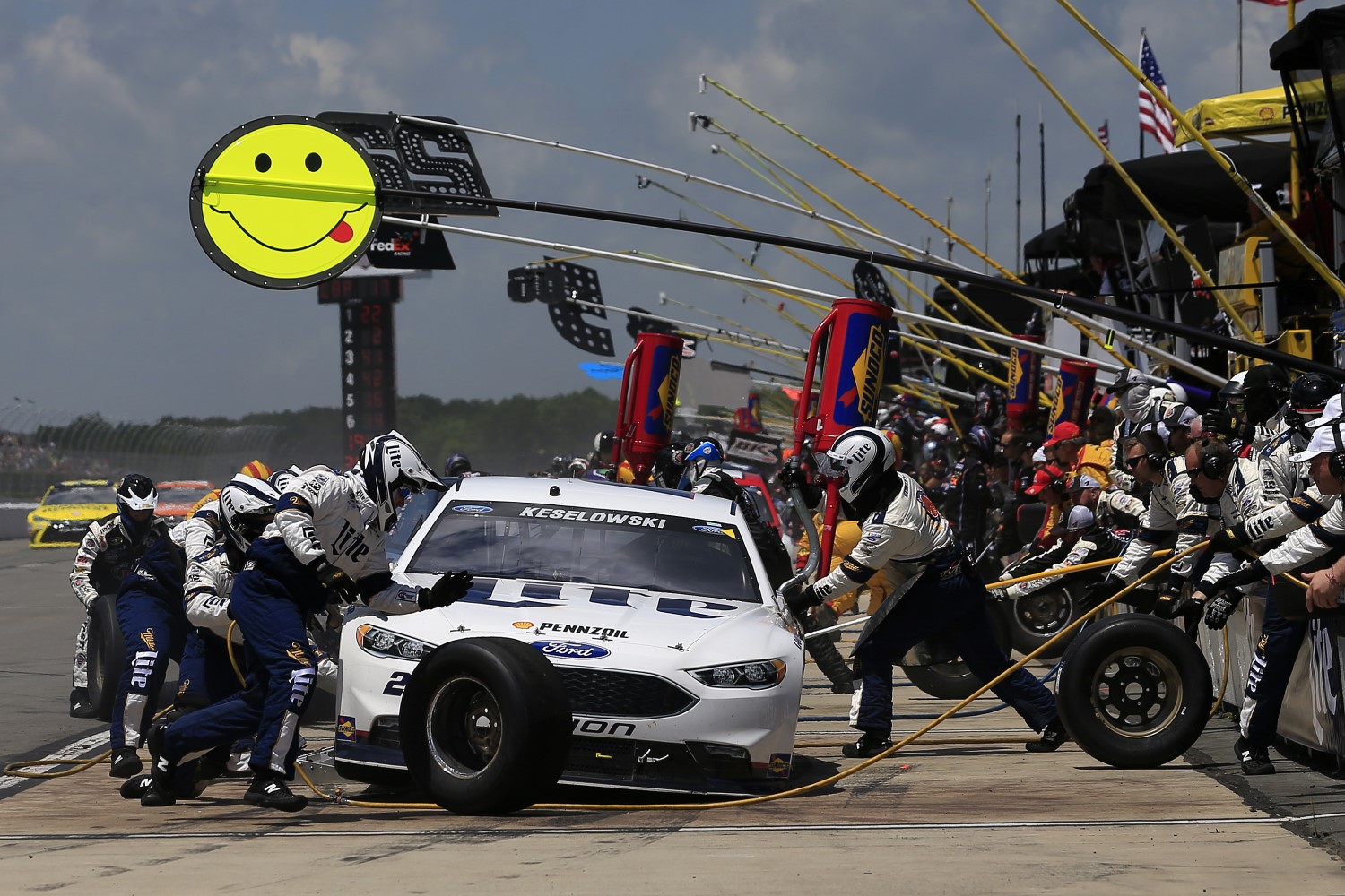 Keselowski's Penske team services his Ford - NASCAR teams find new ways to cheat every weekend