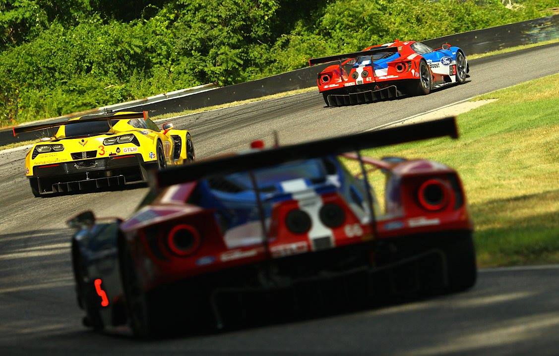 The leading Corvette chases the leading Ford GT in early action