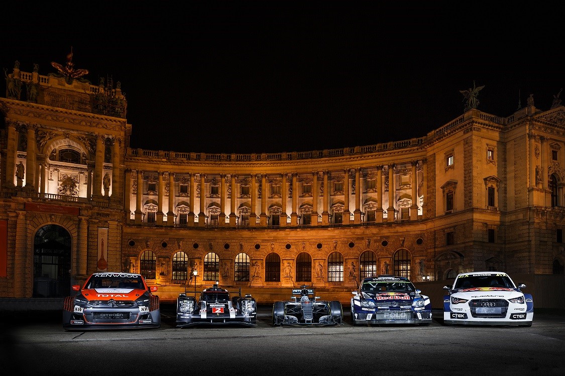 The FIA World Championship-winning cars assembled outside the Imperial Hofburg Palace in Vienna. From L to R; CitroÃ«n C-Elysée (WTCC), Porsche 919 Hybrid (WEC), Mercedes AMG F1 W07 Hybrid, Volkswagen Polo R (WRC), Audi S1 (World RX)