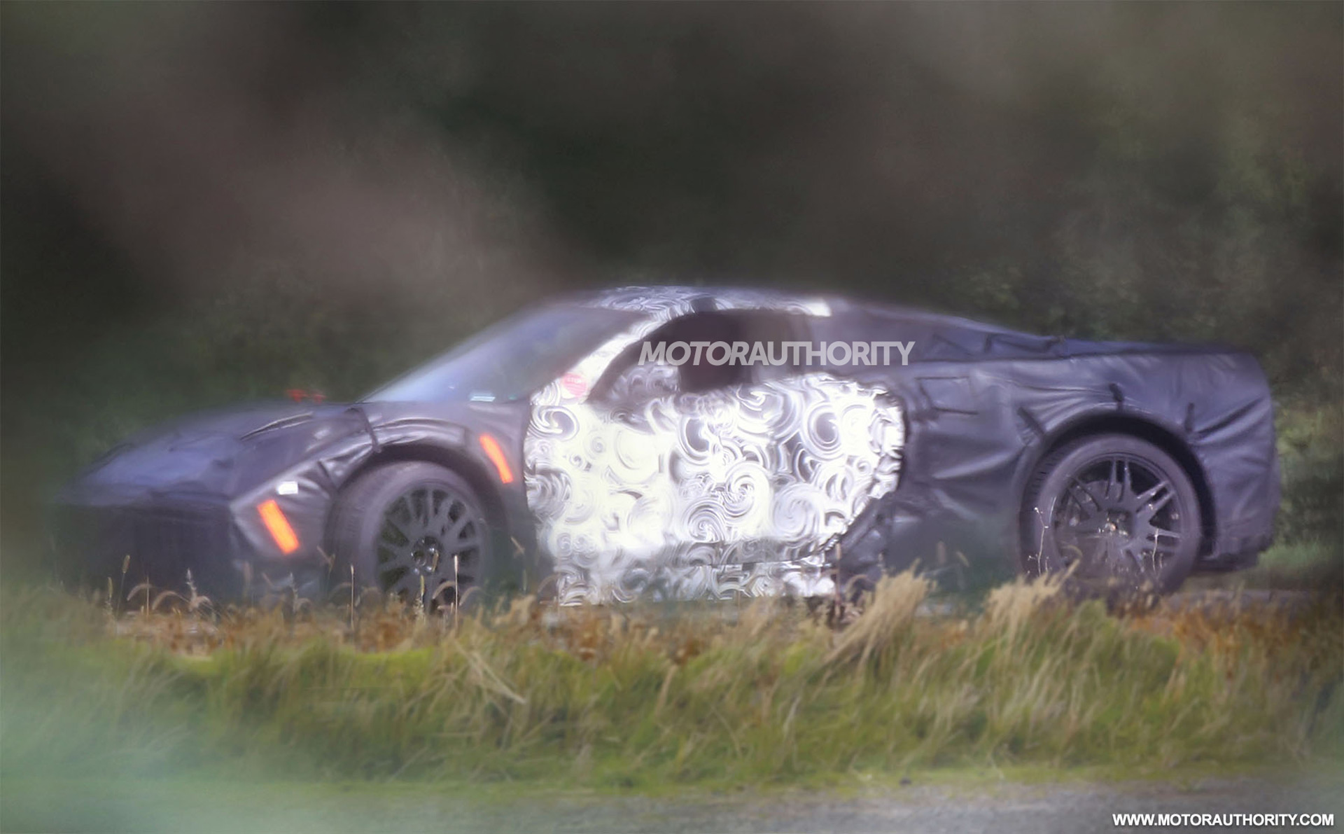 This Motor Authority spy photo of a C8 mule is heavily cammoflaged
