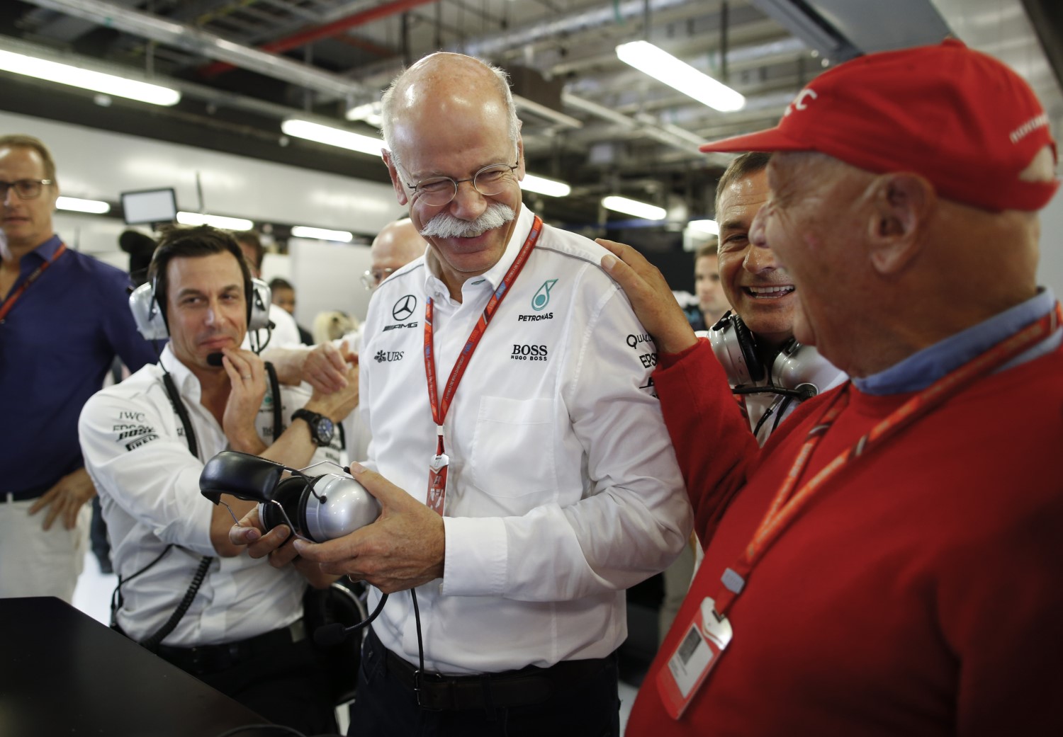 Zetsche jokes with Wolff and Lauda at Abu Dhabi over the weekend