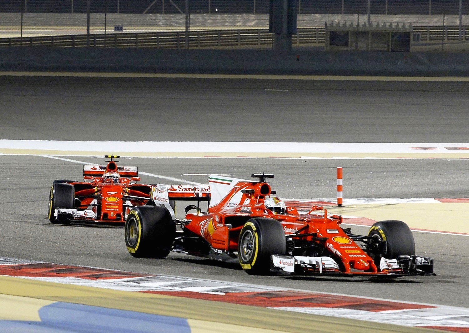 Vettel leads Raikkonen