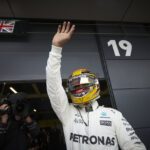 Lewis Hamilton waves to his fans