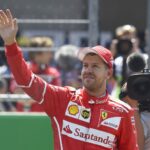 Vettel waves to the cheering fans