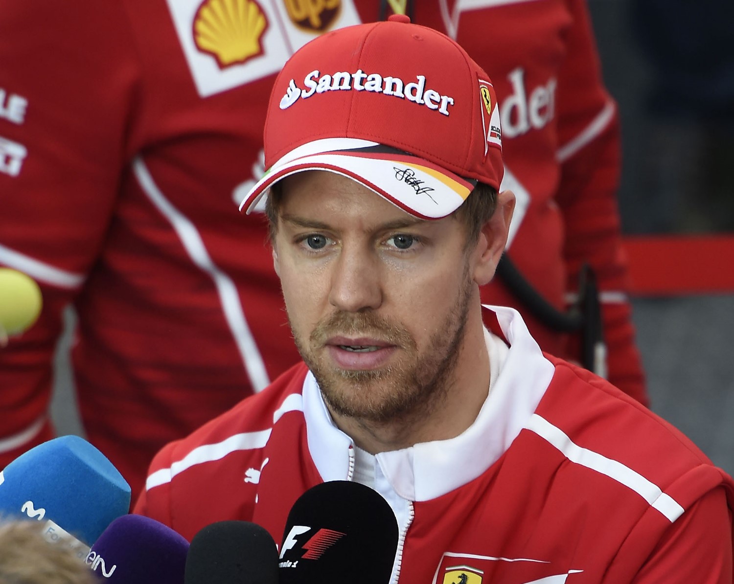 Vettel talks to the media