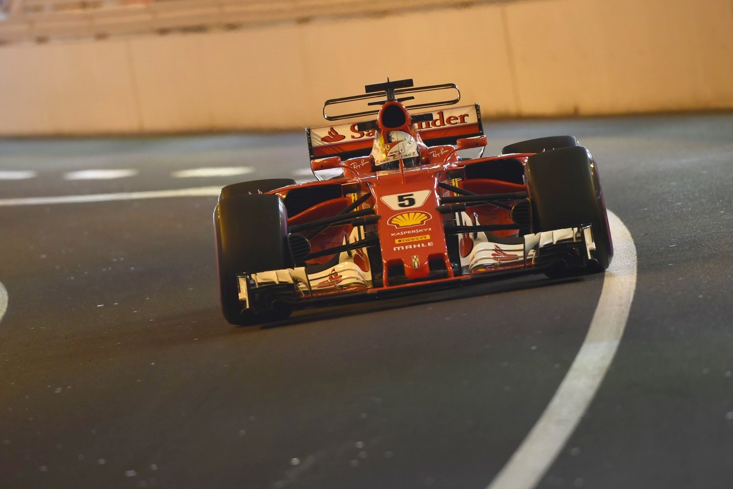 Sebastian Vettel powers throught the tunnel 