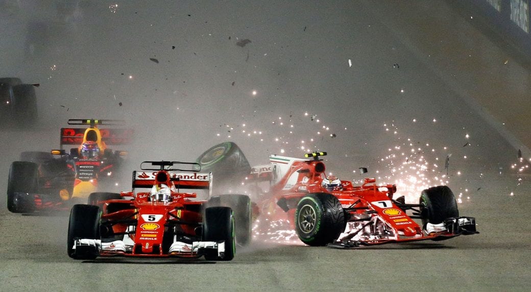 Raikkonen clips Verstappens wheel and careens into his teammate Vettel ending the race for all three