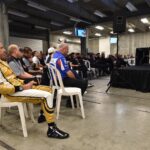 Helio Castroneves listens intently during the Driver's Meeting