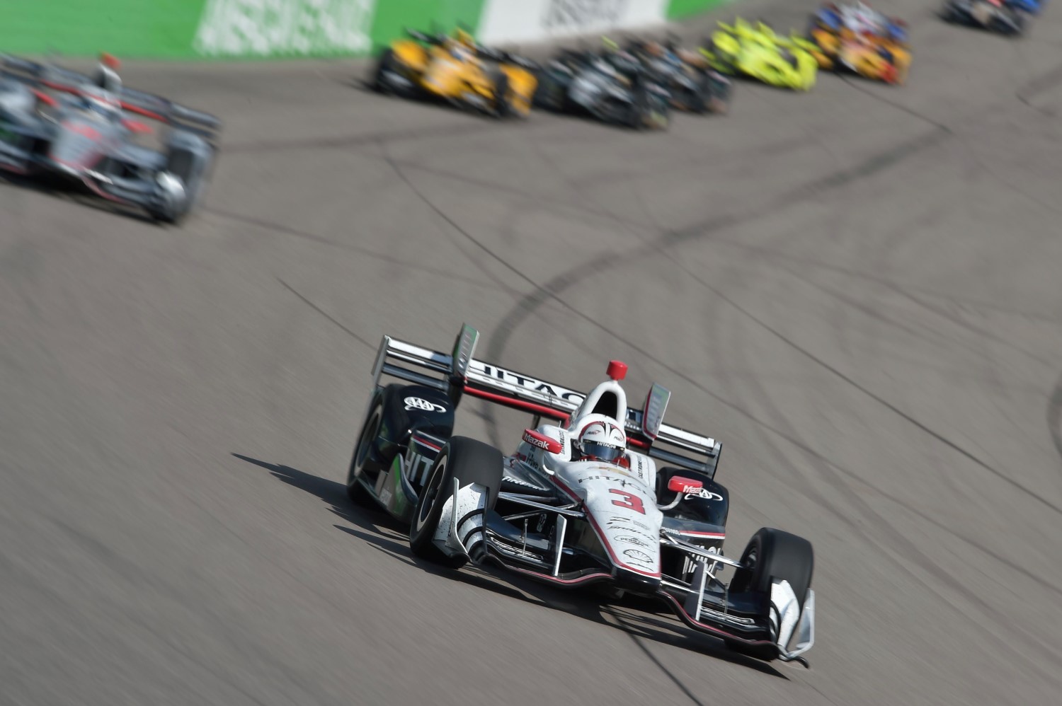 Castroneves charges to victory