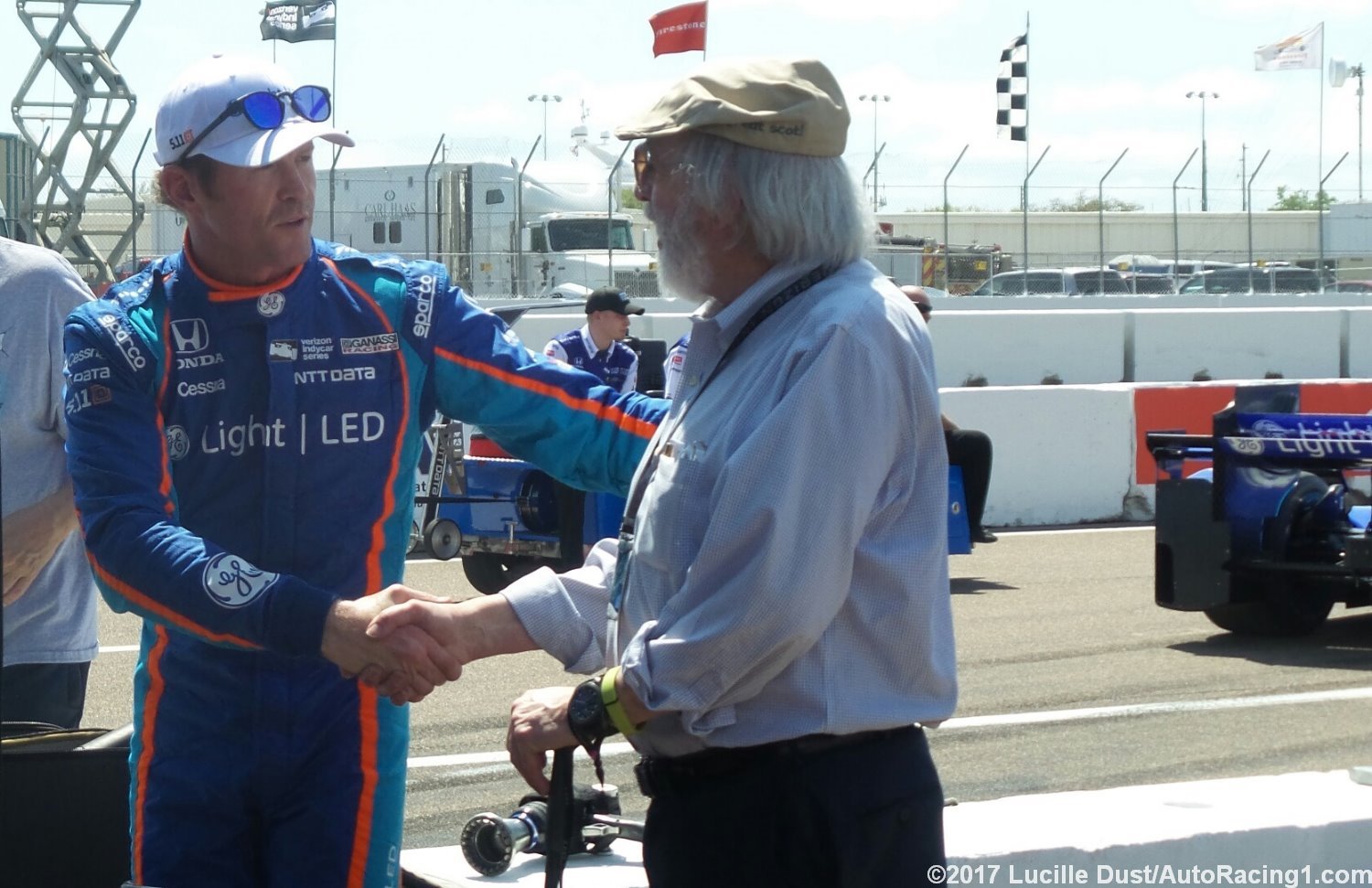 Scott Dixon talks to his former team owner Bruce McCall who gave him a start in CART IndyCar.