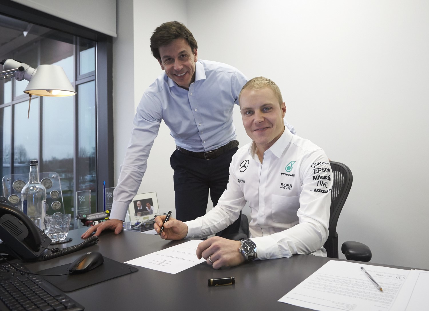 Wolff (L) and his new driver Bottas