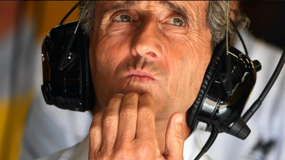Alain Prost watches timing monitor knowing Renault is wasting their time in F1. They have no chance.