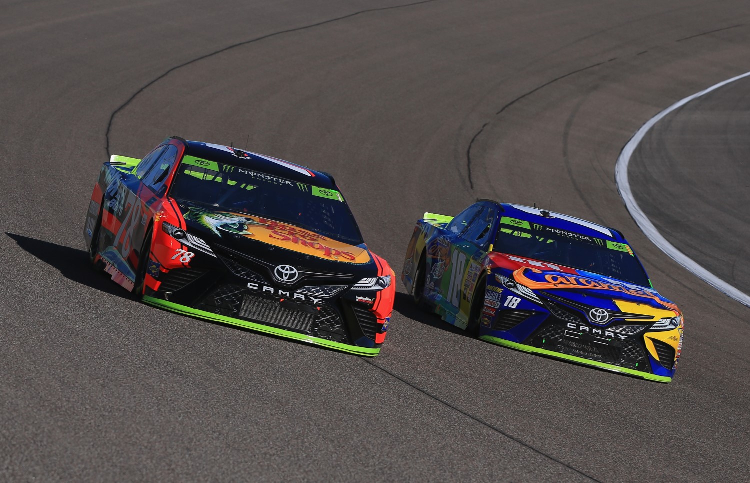 Toyota drivers Martin Truex Jr. and Kyle Busch battle for the title