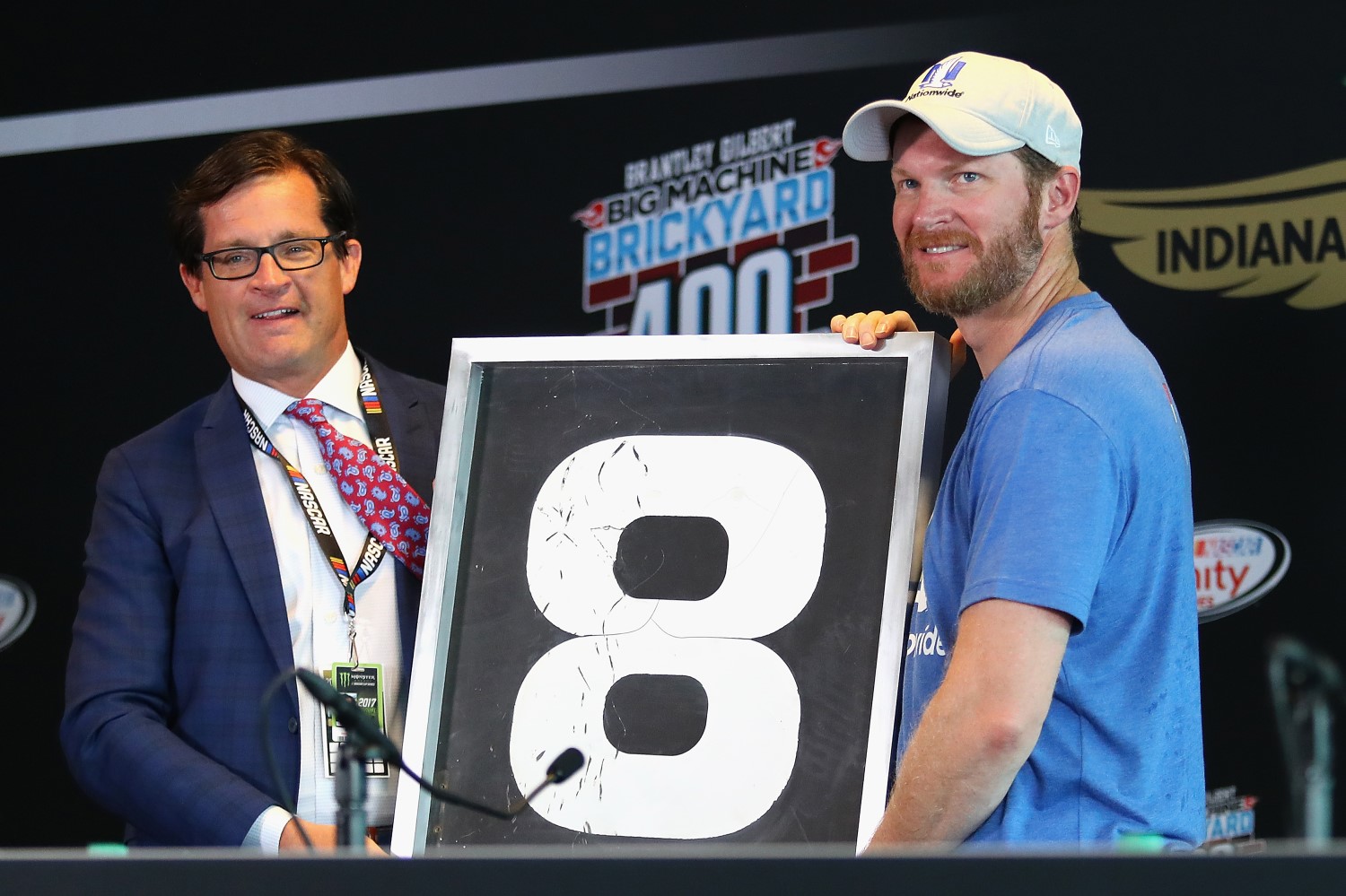 IMS President Doug Boles presents Dale Jr. with a special gift