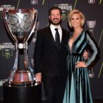 Martin Truex Jr. and life partner Sherry with the Monster Cup trophy