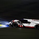 The lone #1 Porsche streaks through the night