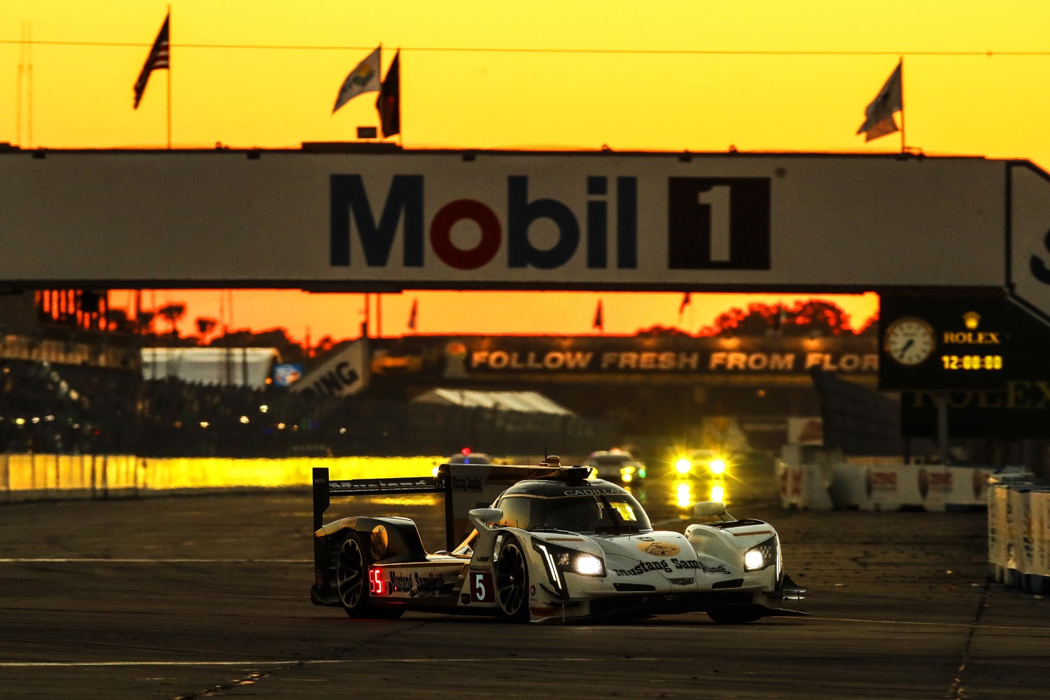 The #5 Cadillac still leads as the sun sets on Sebring
