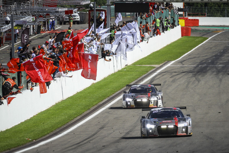 The #25 Audi crosses the line to win