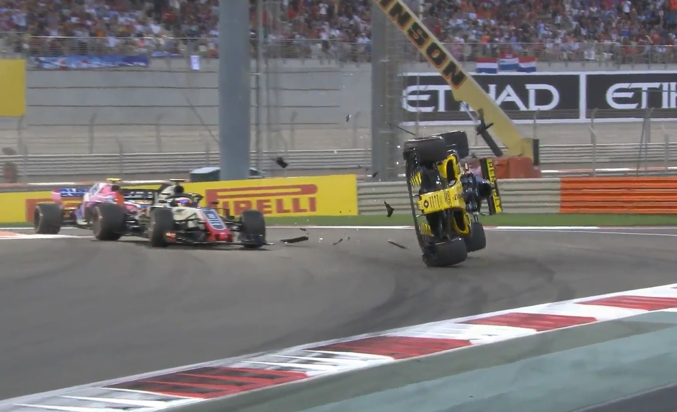 Hulkenberg Flips after touching wheels with Grosjean