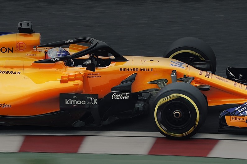 The minuscule Coca-Cola logo to adorn the McLaren cars