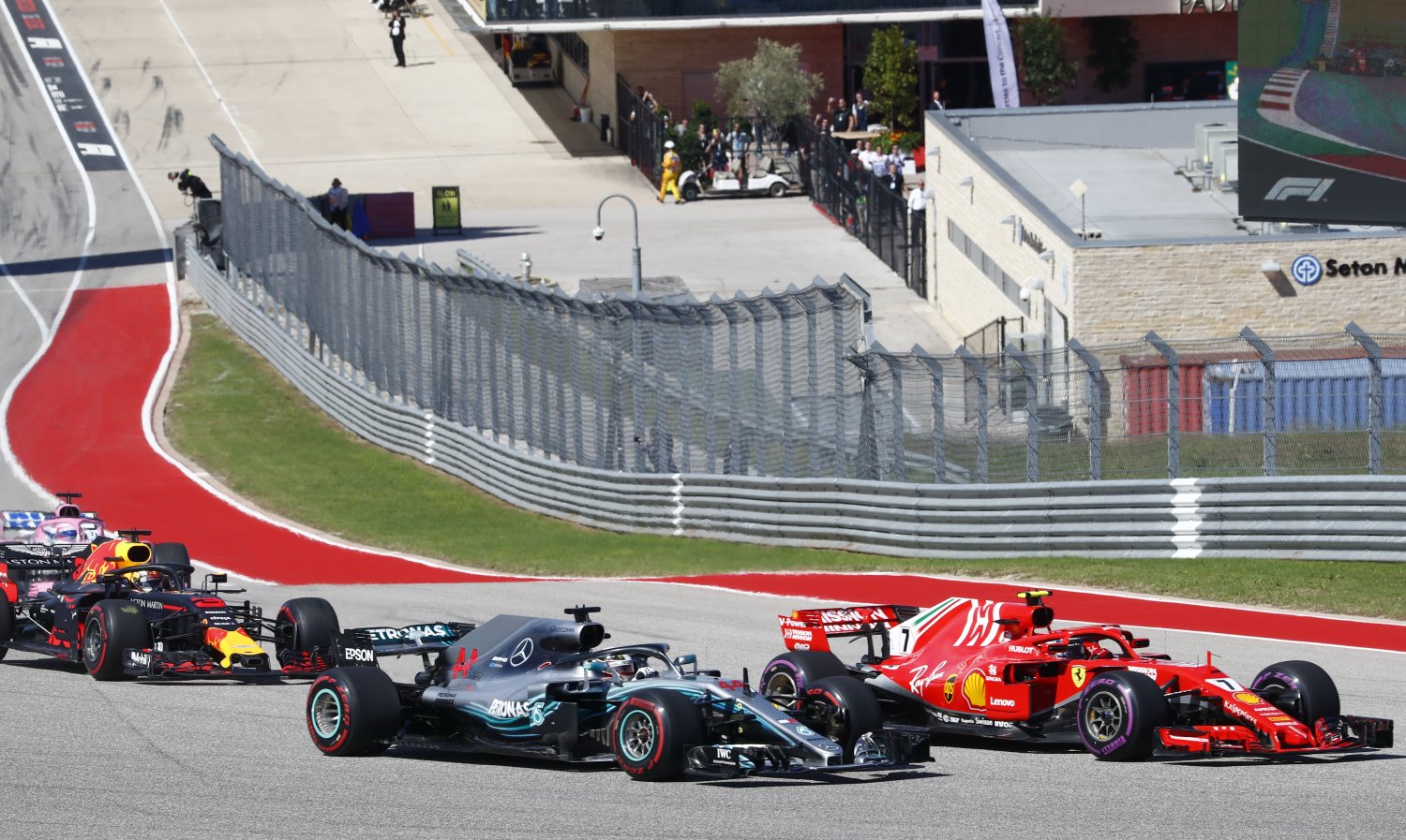 Raikkonen beats Hamilton into Turn 1 at the start