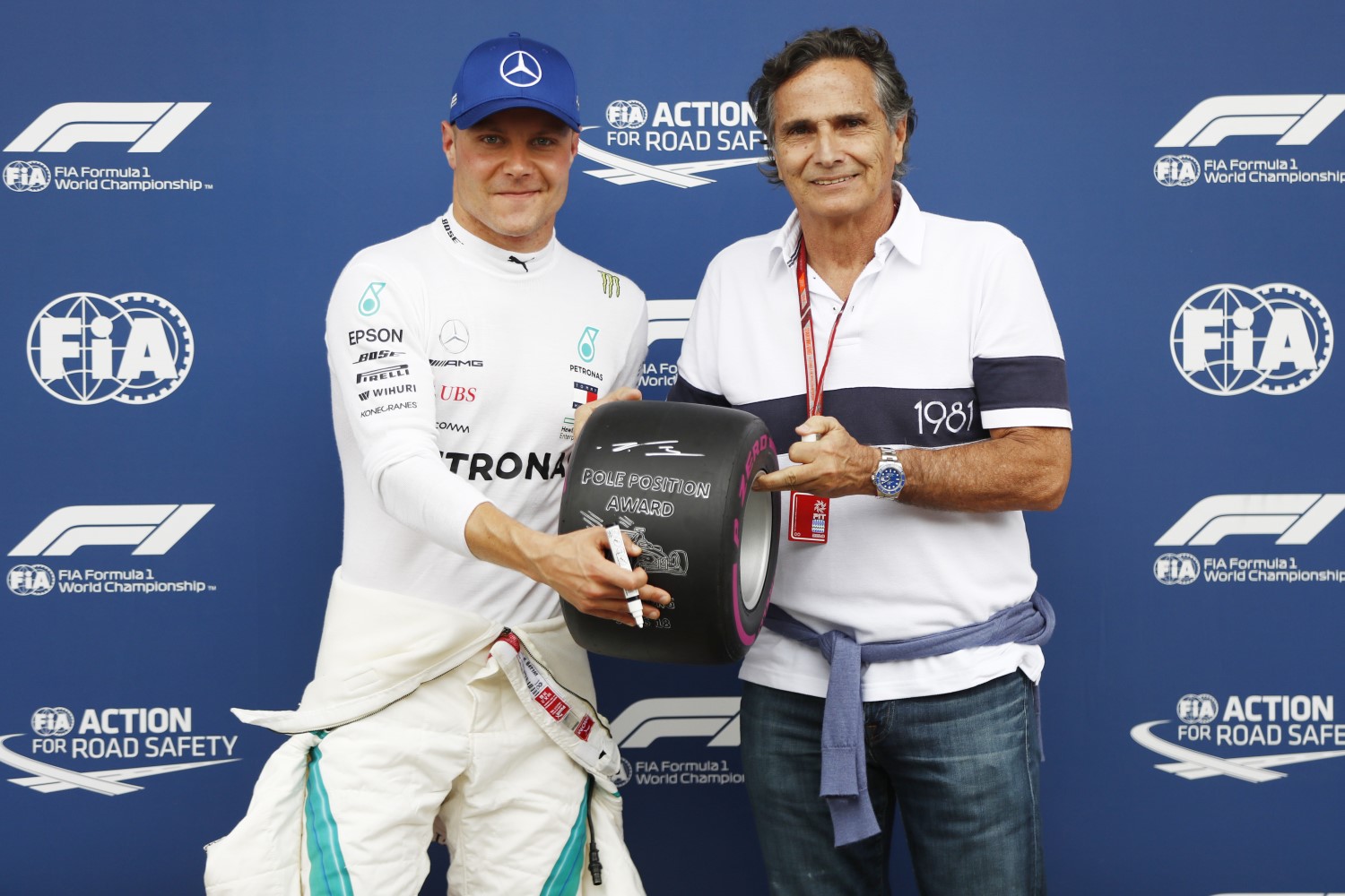 Bottas with Nelson Piquet after winning pole Saturday