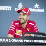 Vettel talks to the media