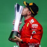 Vettel kisses his trophy