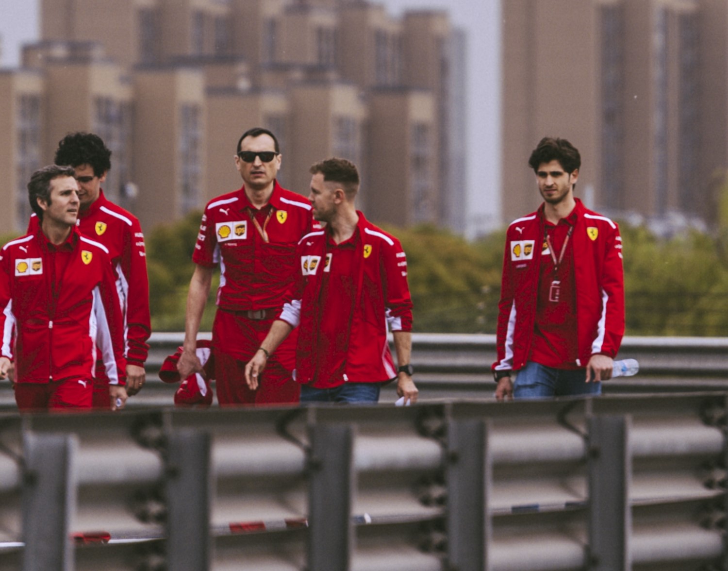Vettel sporting shorter haircut on track walk with Ferrari crew in Shanghai