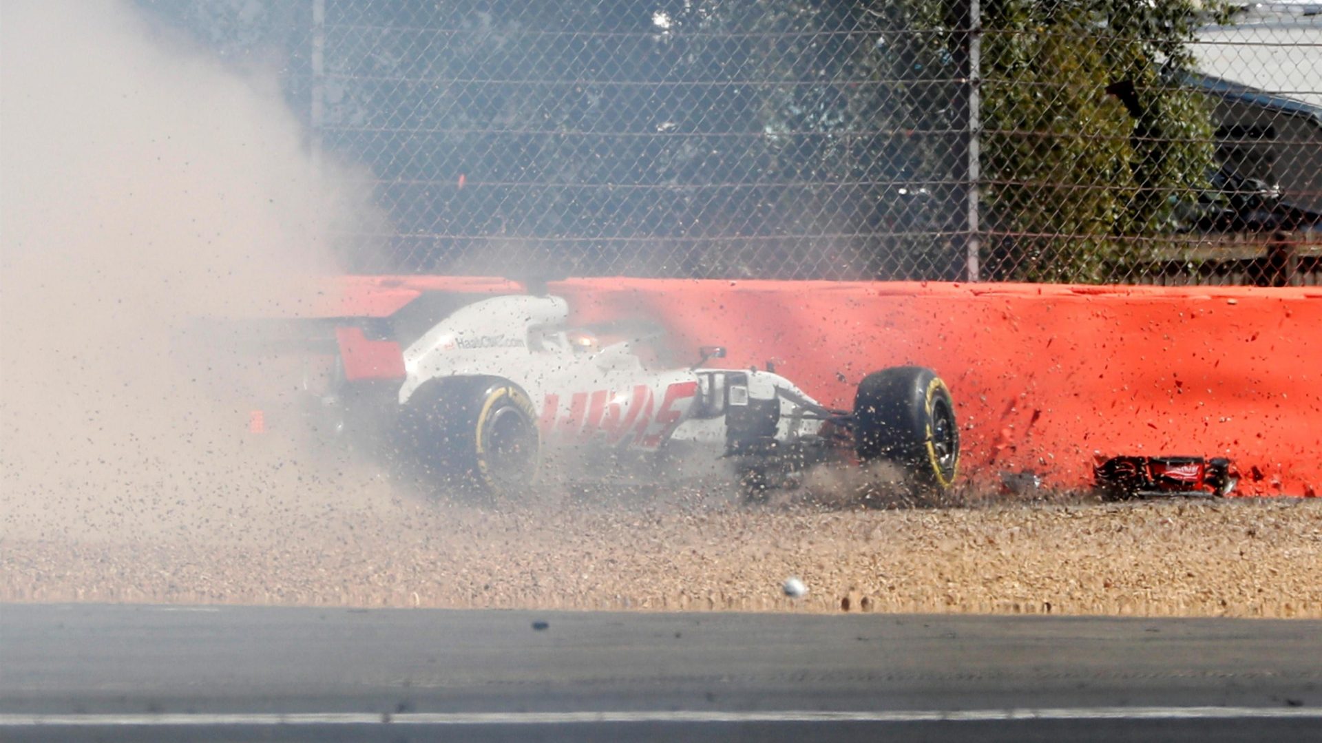 Romain 'crash' Grosjean crashing at Silverstone. Grosjean never knew a barrier he did not like to hit