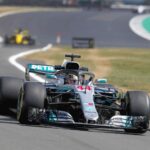 Hamilton digs deep to nip Vettel for pole