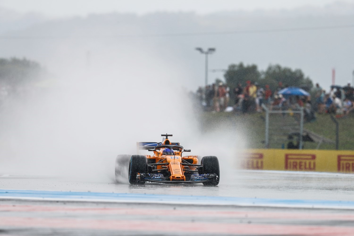 Alonso in the rain at Paul Ricard Saturday. He does not want to race anymore for a backmarker team like McLaren