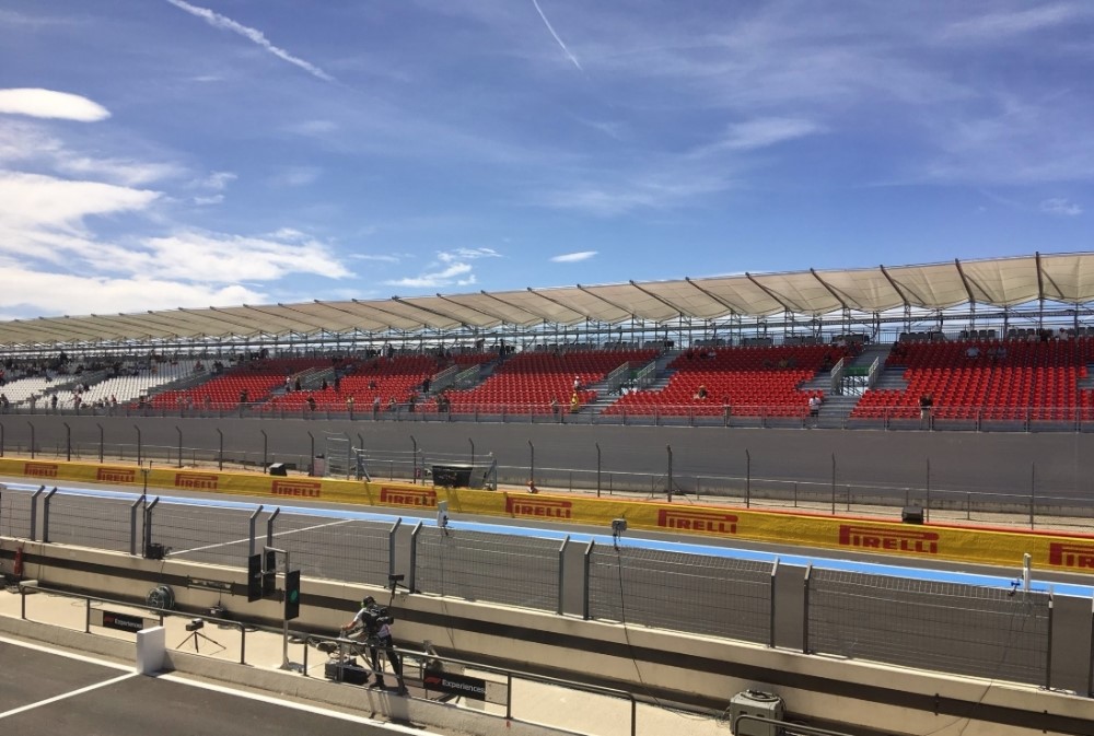 Empty grandstands give the race no excitement