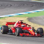 Vettel charges to pole