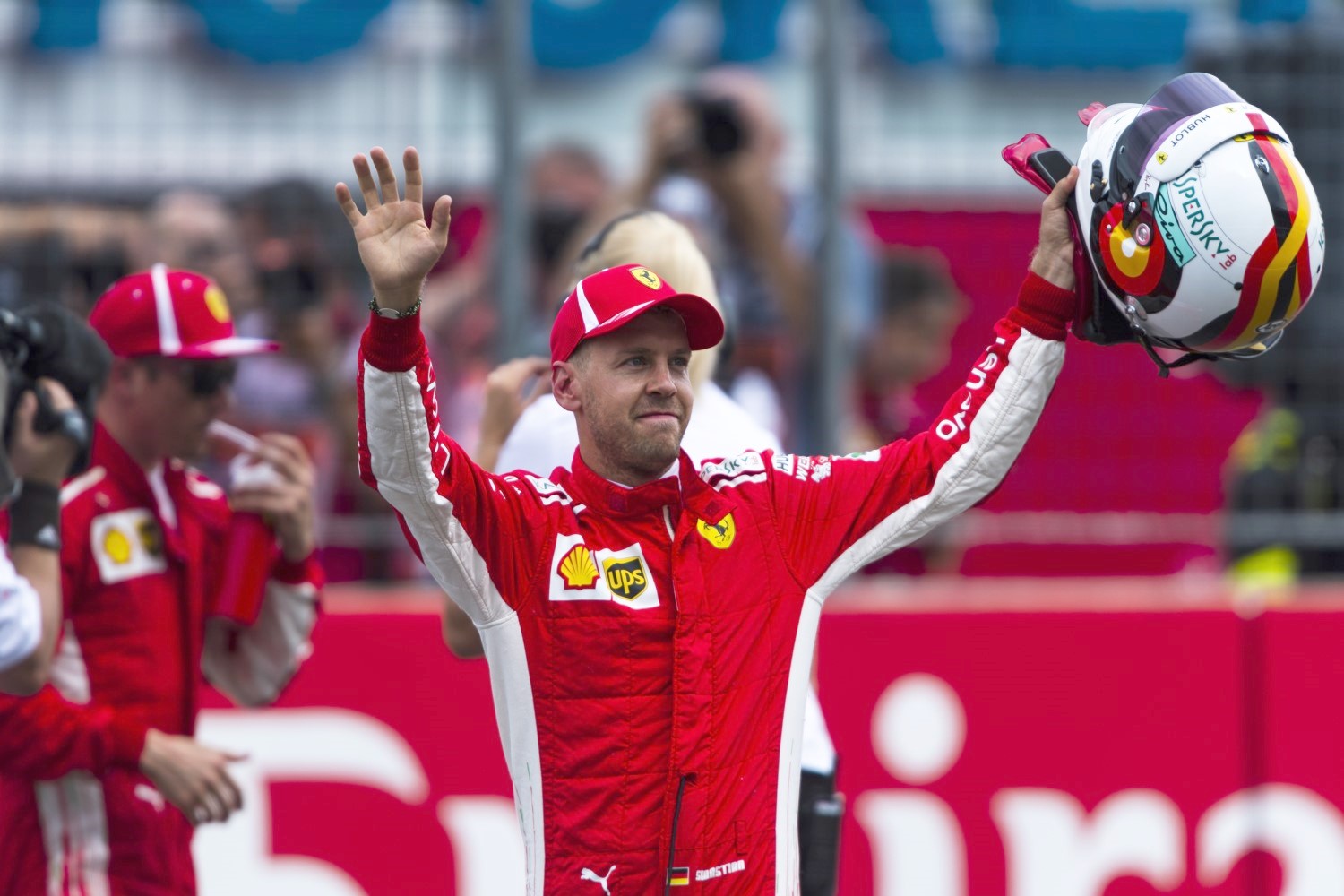 Vettel waves to the German crowd