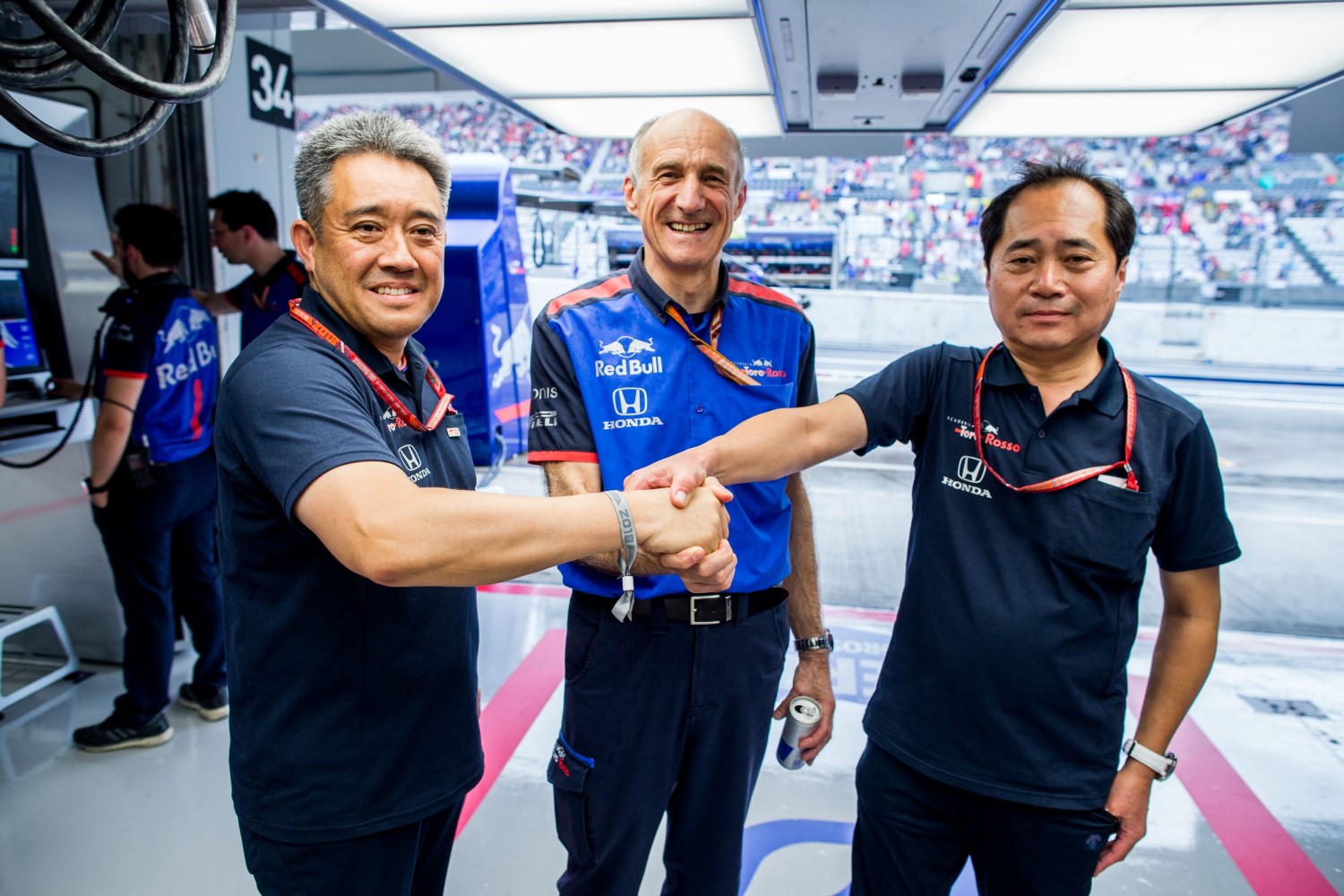 Tost (C) and Tanabe (R) celebrate Honda burying the bottom feeding McLaren Renault team