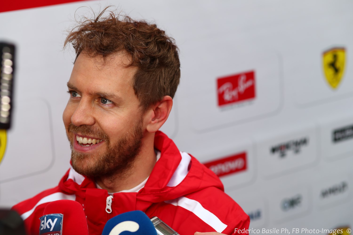 Should Vettel be looking so happy?